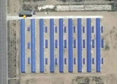 An expansive cryptocurrency mining farm with numerous machines
