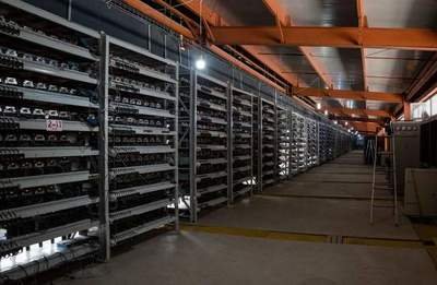 Modern mining farm with racks of ASIC machines in Canada