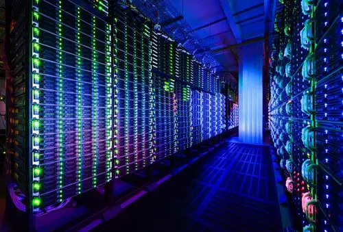 A vast hall filled with rows upon rows of mining rigs, showcasing the scale of a large-scale mining farm operation.